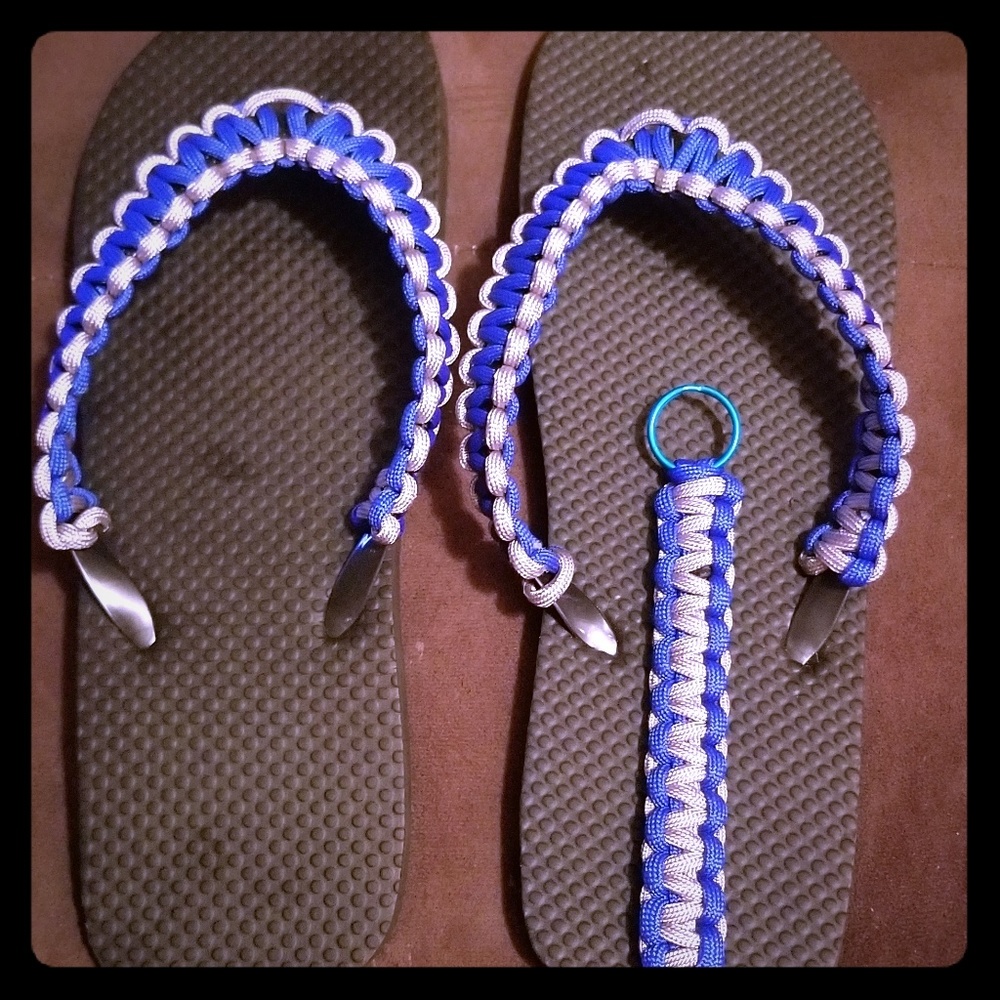 blue and silver flip flops and keychain